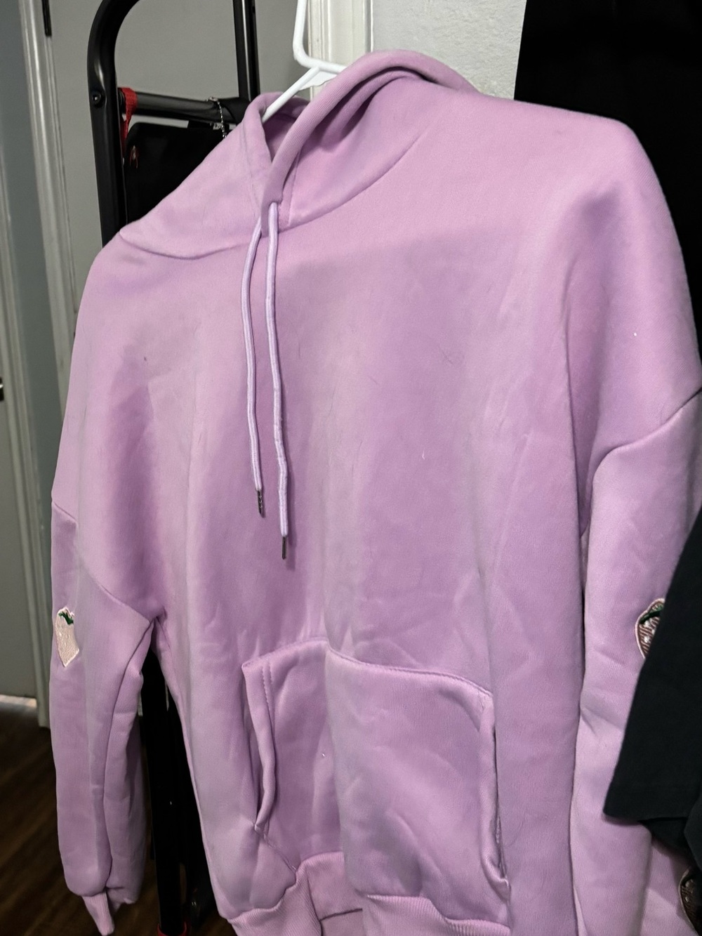 purple hoodie with strawberry with strawberries on the side, sleeves polyester
